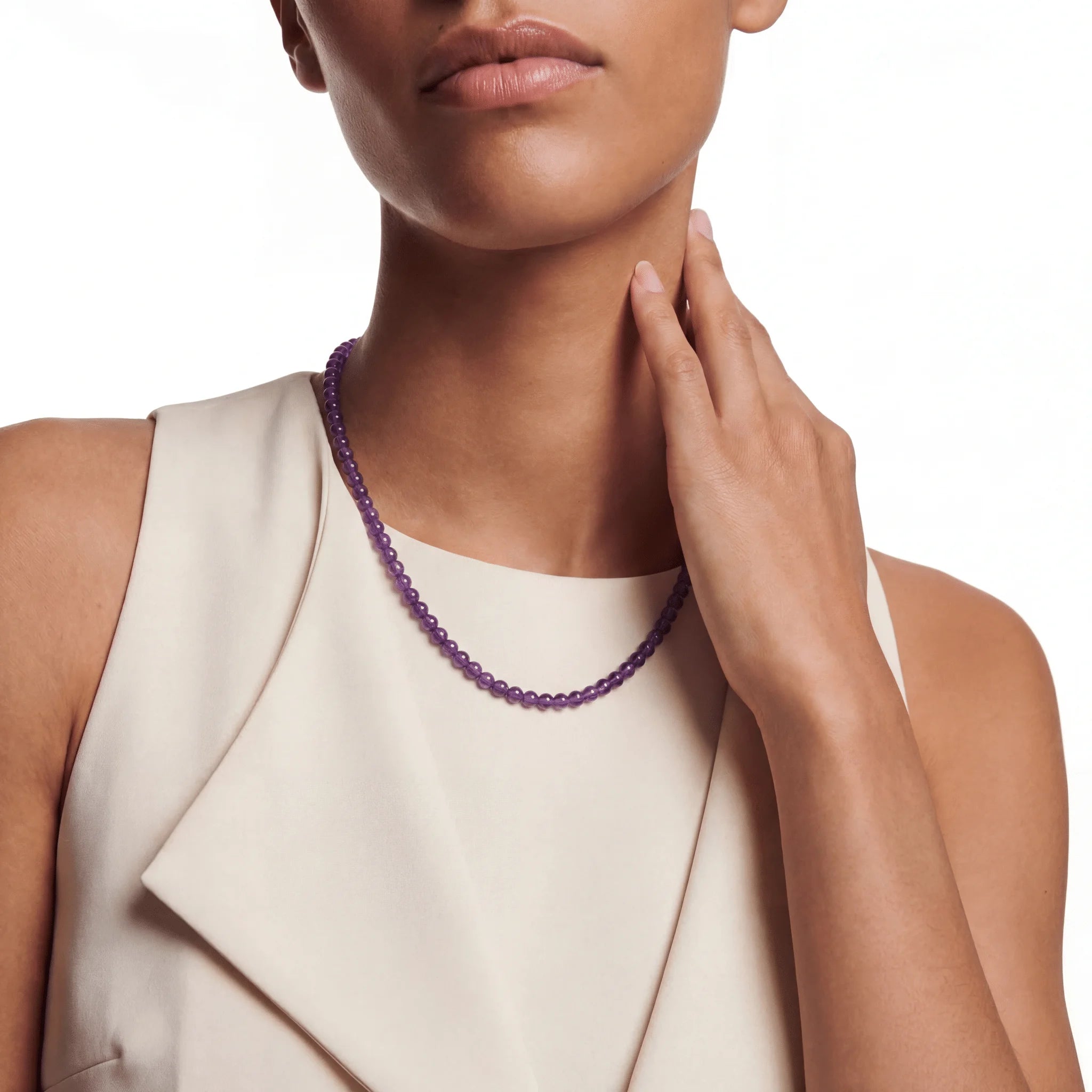 The Amethyst Orbit — Triple Sequence, bracelet on wrist, lifestyle model photo BE.