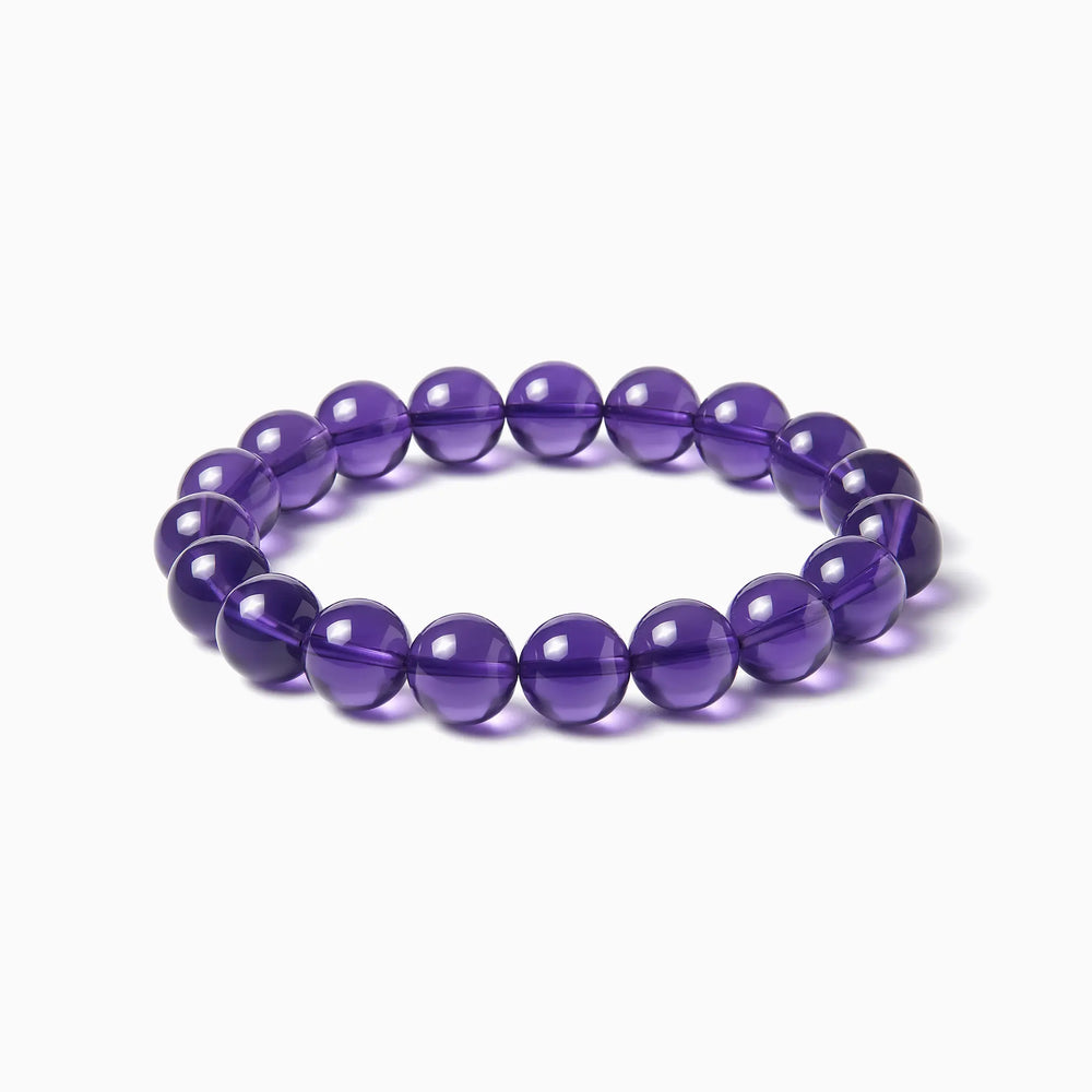 The Amethyst Strand — Bolivian Depth, bracelet on white background BE.