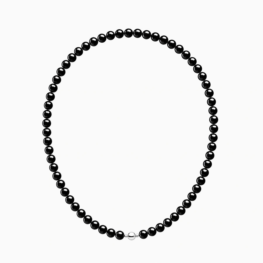 Black bead necklace with a round silver-coloured clasp, full front view on a white background.