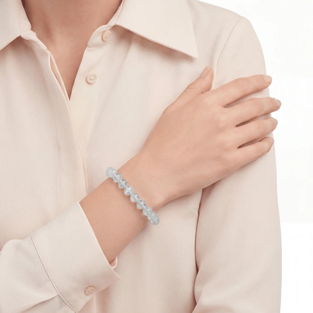 The Blue Needle Strand — Optical Architecture, bracelet worn on wrist, lifestyle model photo BE.