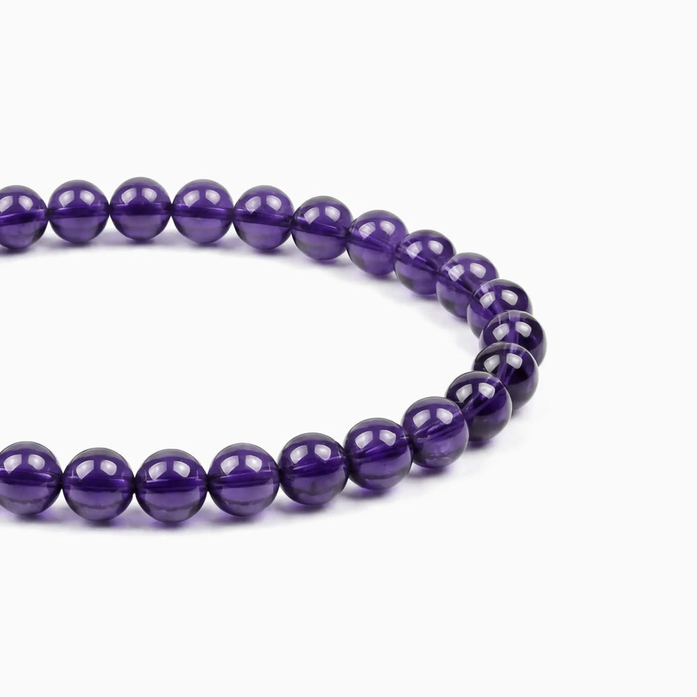The 6mm Bolivian Amethyst Strand — The Void, bracelet detail view BE.