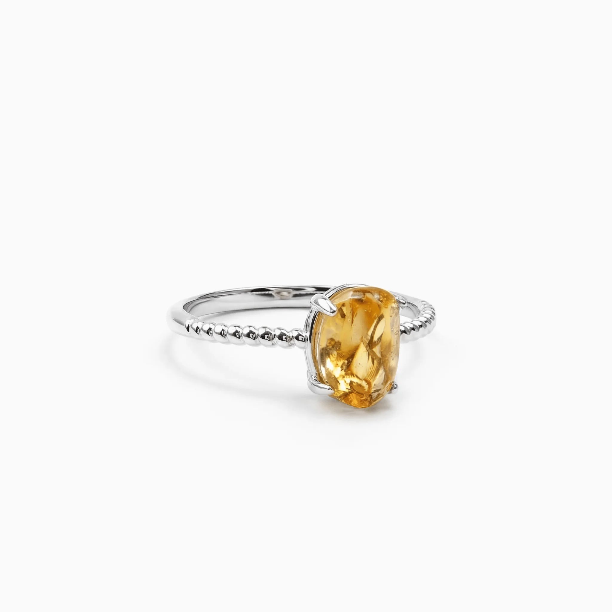 The Citrine Extrusion, ring on white background BE.