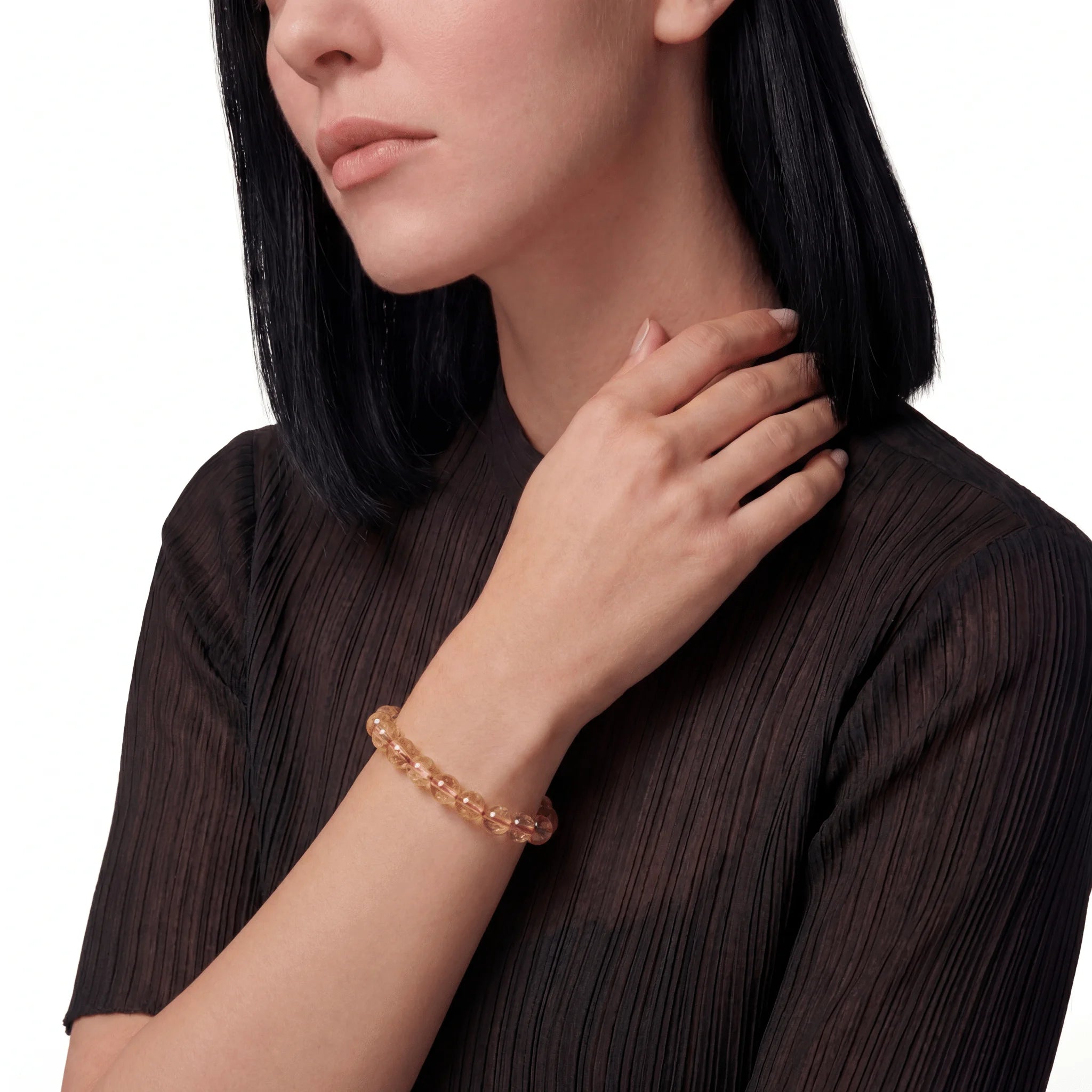 The Citrine Strand — Solar Convergence, bracelet on wrist, lifestyle model photo BE.