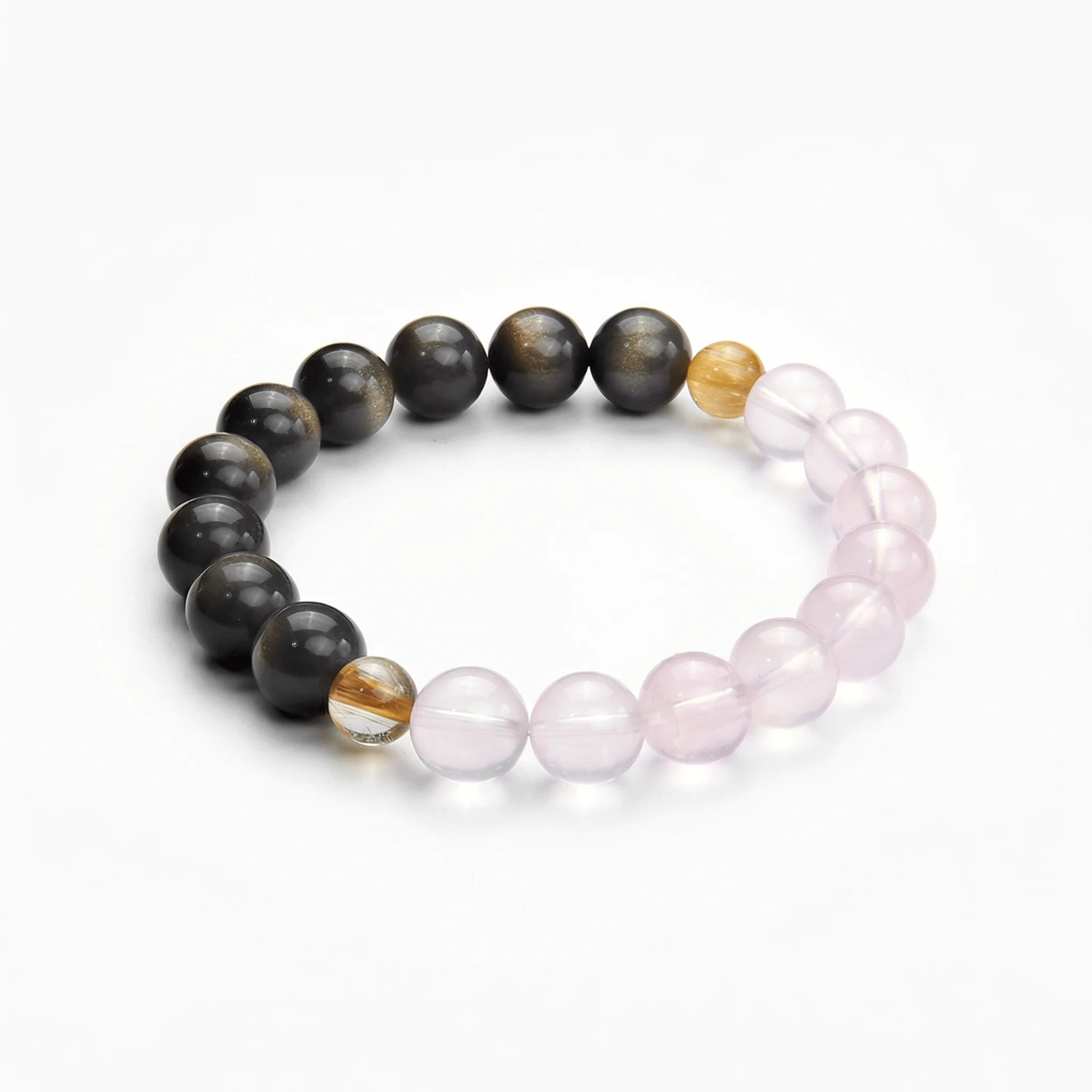 The Dual-Mineral Strand — Obsidian & Quartz, bracelet on white background BE.