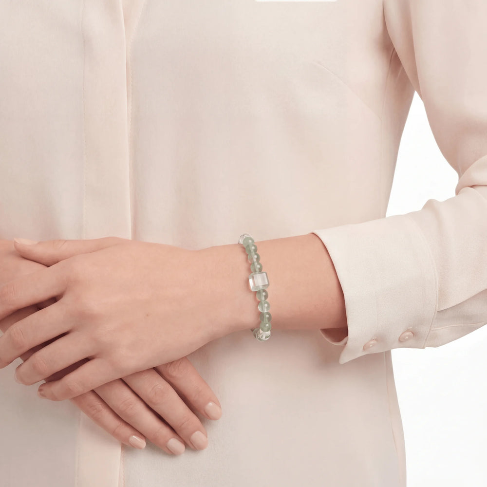The Emerald Phantom Strand — Cubic Sequence, bracelet on wrist, lifestyle model photo BE.