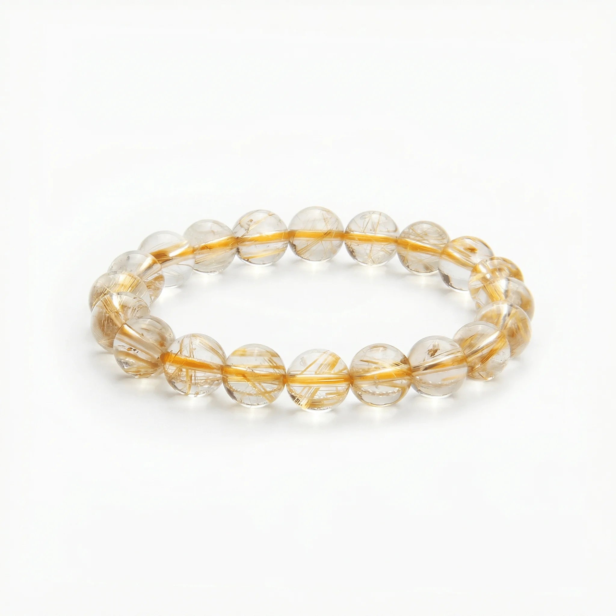 Golden Rutilated Quartz Powerflow Bracelet, bracelet on white background BE.