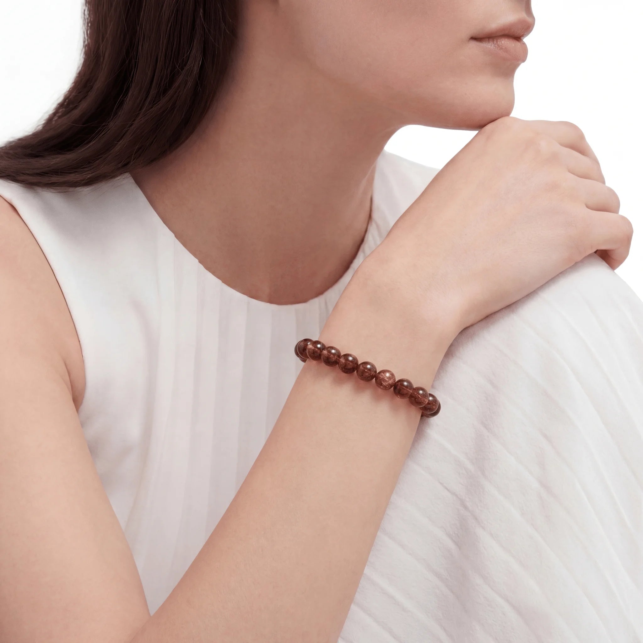 The Mineral Matrix Strand — Geological Fusion, bracelet worn on wrist, lifestyle model photo BE.