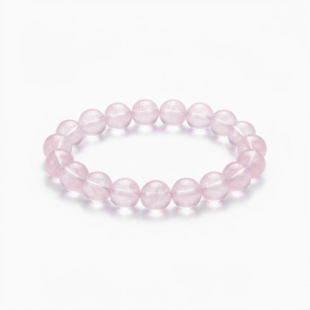 The Rose Quartz Strand — Serene Luminescence, bracelet on white background BE.