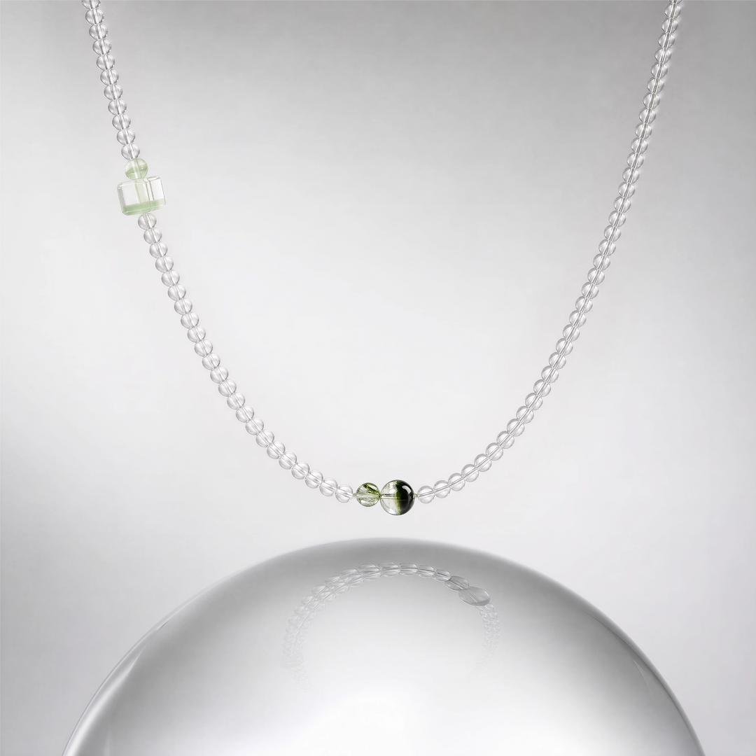 The Emerald Phantom Bracelet - Tri-Wire Architecture detail with clear quartz and green phantom accents, BE.