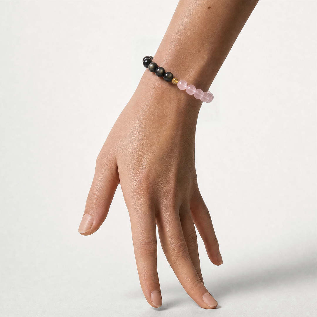 The Obsidian, Pink Quartz and Rutilated Quartz Bracelet worn at the wrist, BE.