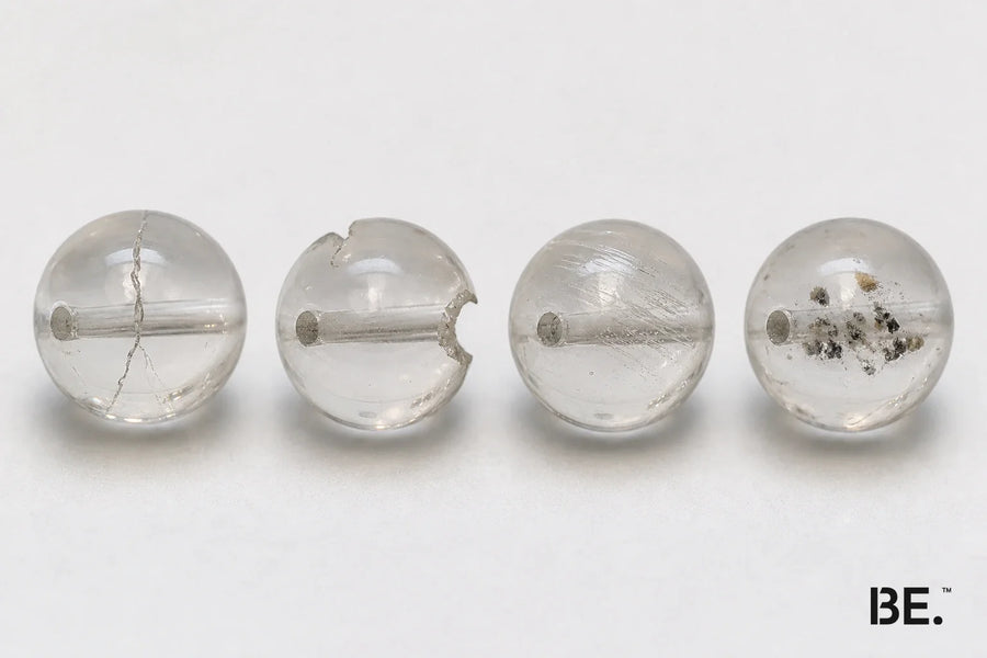 Four crystal bead observations comparing a surface crack, edge chip, scratch and internal inclusion — BE.