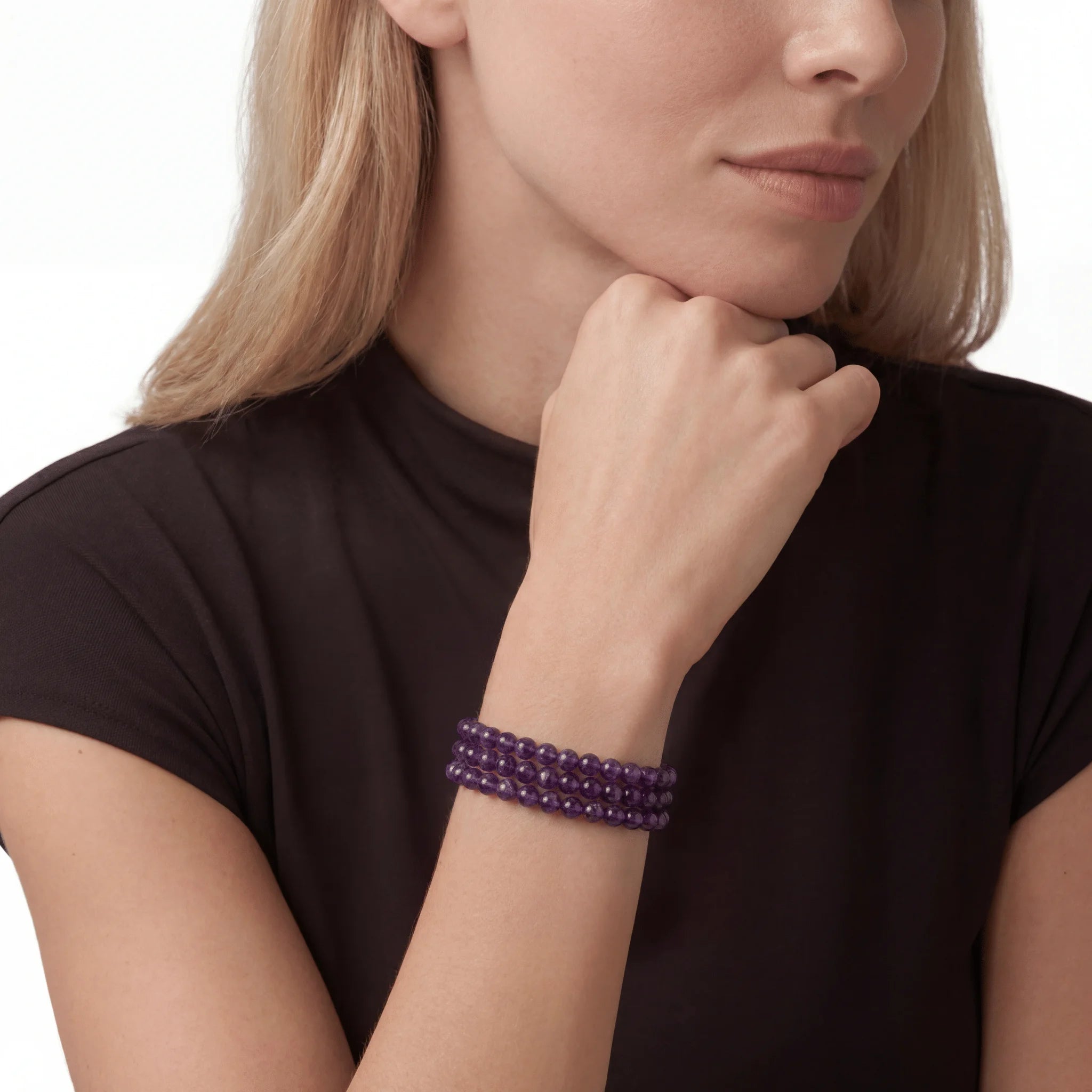 The Amethyst Orbit — Triple Sequence, bracelet worn on wrist, lifestyle model photo BE.