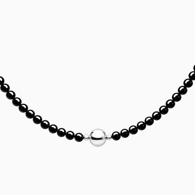 Black Onyx necklace, close-up of the beads and round connector