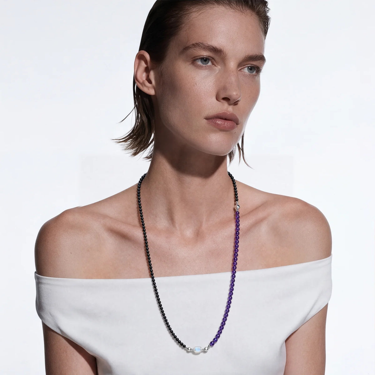 Even longer: a necklace and two strands joined, worn long