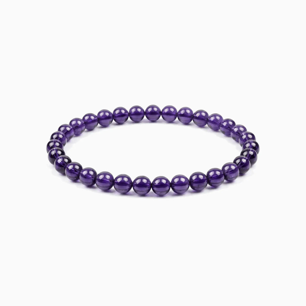 The 6mm Bolivian Amethyst Strand — The Void, bracelet on white background BE.