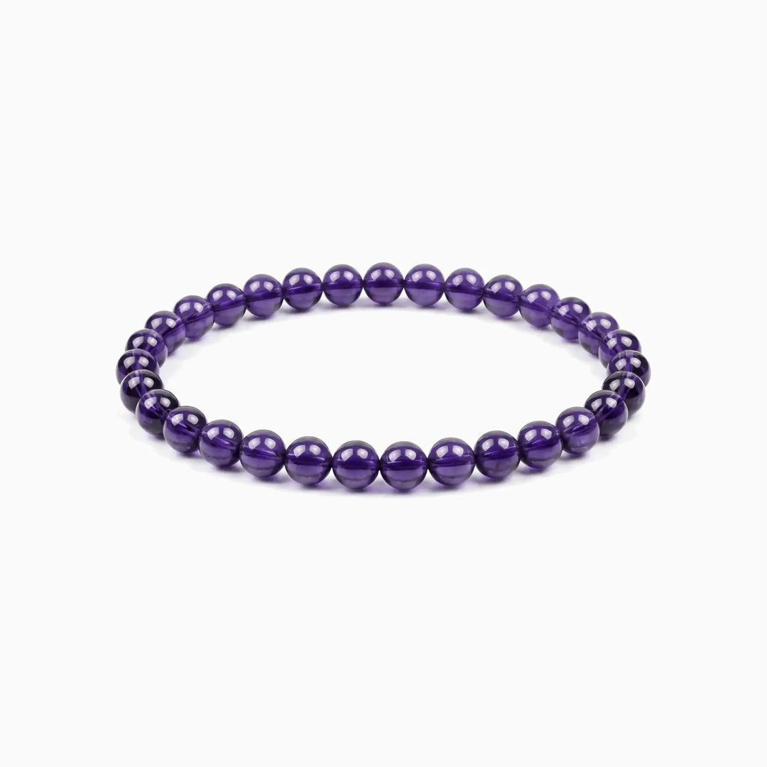 The 6mm Bolivian Amethyst Strand — The Void, bracelet on white background BE.