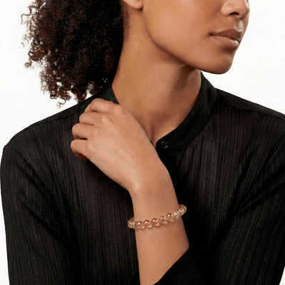 The Citrine Strand — Solar Convergence, bracelet worn on wrist, lifestyle model photo BE.