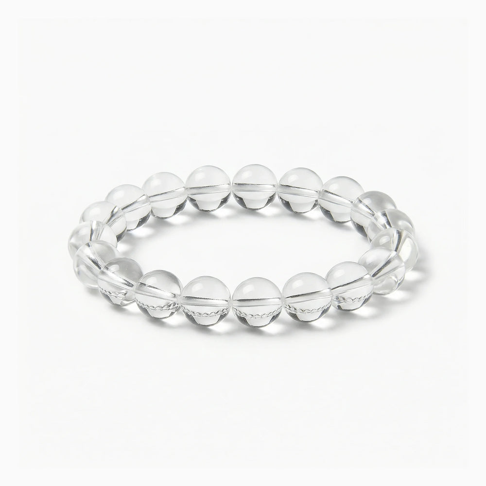 The Clear Quartz Strand — Absolute Clarity, bracelet on white background BE.