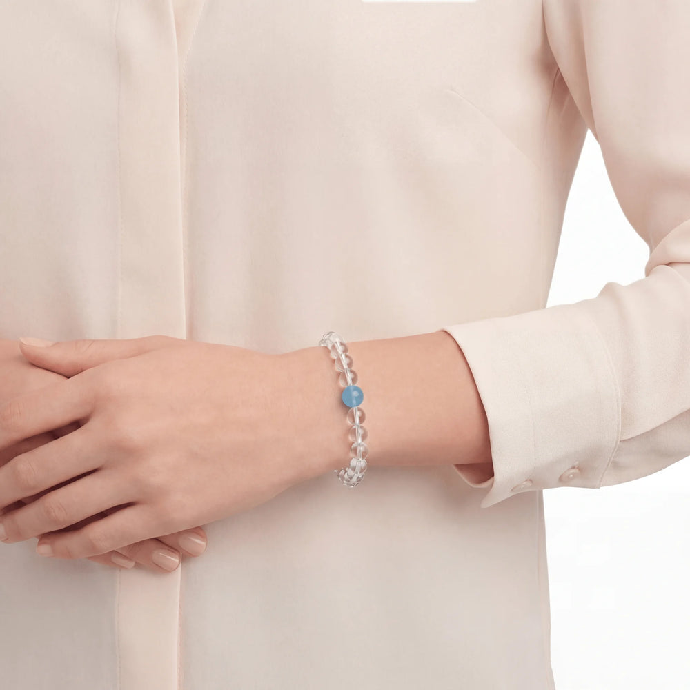 The Dual-Mineral Strand — Oceanic Clarity, bracelet worn on wrist, lifestyle model photo BE.