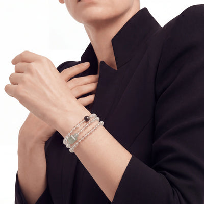 The Emerald Phantom Sequence — Tri-Wire Architecture, bracelet on wrist, lifestyle model photo BE.