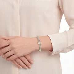 The Emerald Phantom Strand — Cubic Sequence, bracelet on wrist, lifestyle model photo BE.