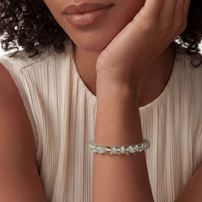 The Emerald Phantom Strand — Geological Archive, bracelet worn on wrist, lifestyle model photo BE.