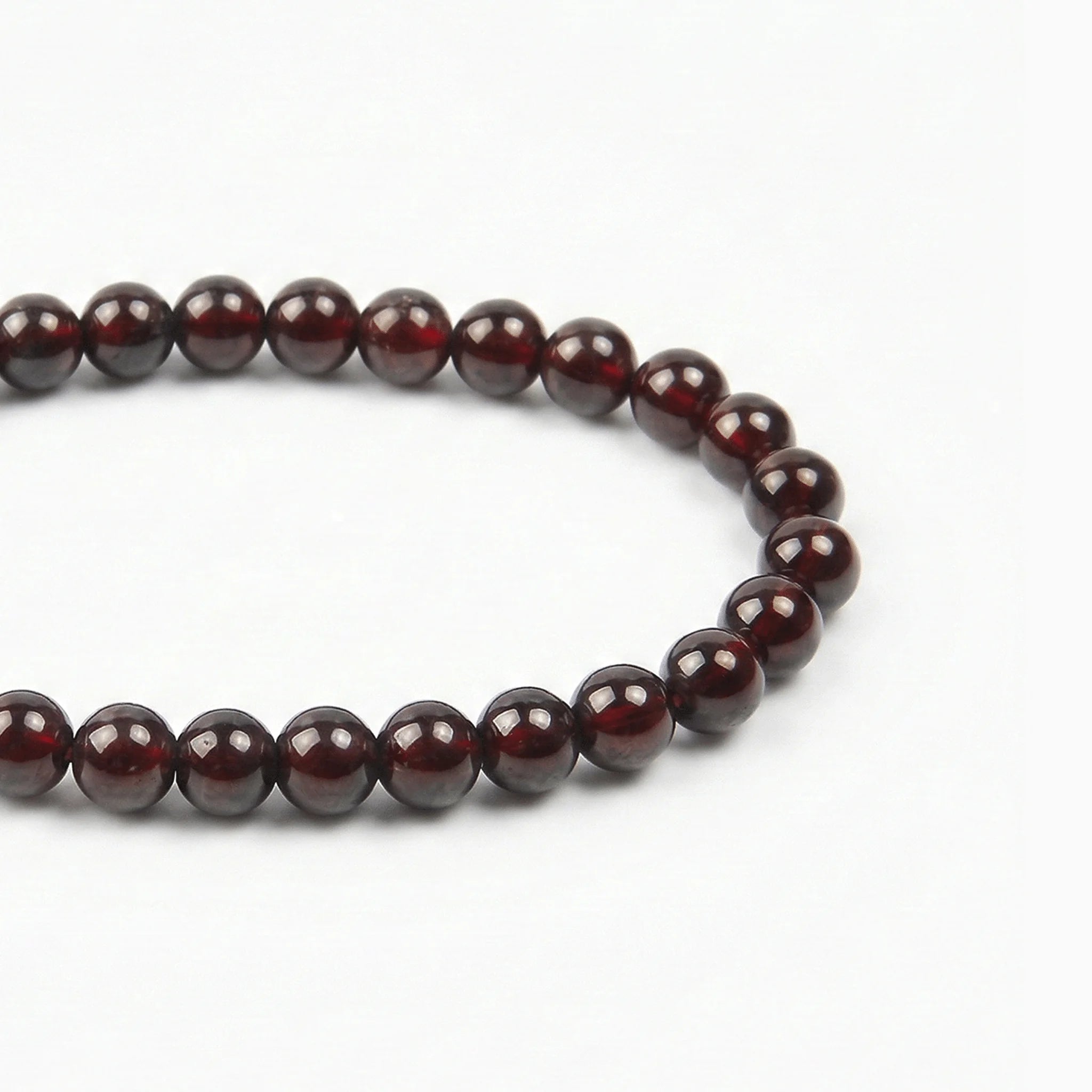 The Garnet Strand — Terrestrial Gravity, bracelet detail view BE.