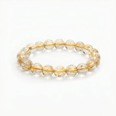 Golden Rutilated Quartz Powerflow Bracelet, bracelet on white background BE.