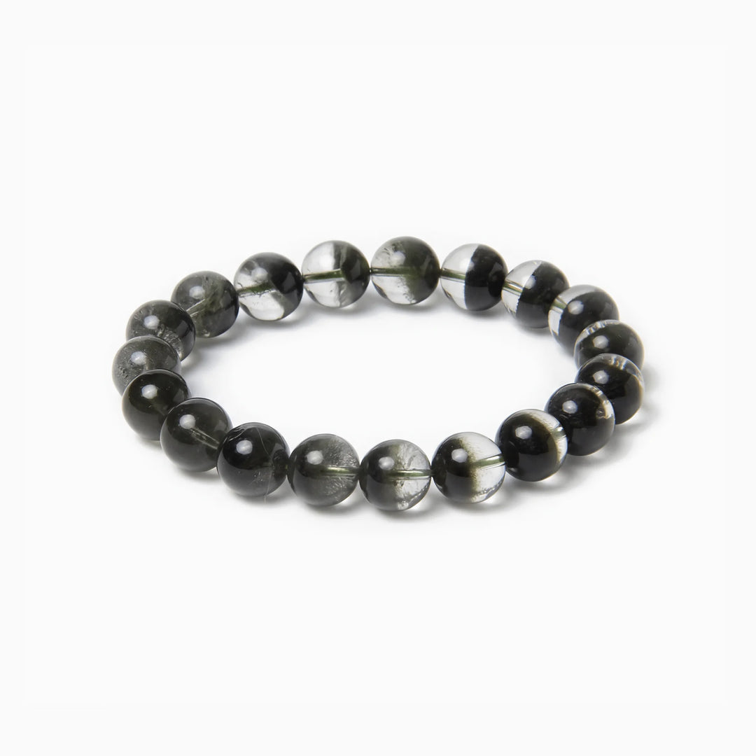 The Green Phantom Strand — Geological Sequence, bracelet on white background BE.
