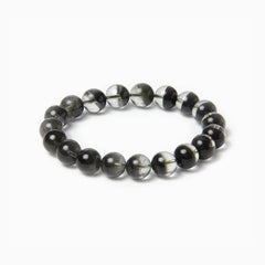 The Green Phantom Strand — Geological Sequence, bracelet on white background BE.