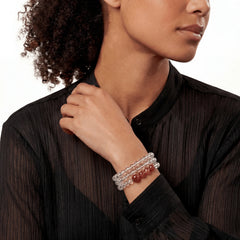 The Hematoid Double Strand — Terrestrial Architecture, bracelet worn on wrist, lifestyle model photo BE.
