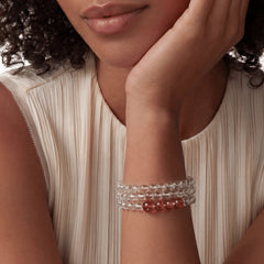 The Hematoid Double Strand — Terrestrial Architecture, bracelet on wrist, lifestyle model photo BE.