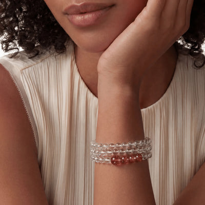 The Hematoid Double Strand — Terrestrial Architecture, bracelet on wrist, lifestyle model photo BE.