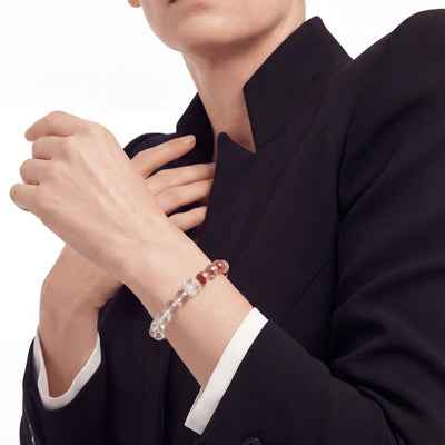 The Hematoid Strand — Iron & Silica, bracelet worn on wrist, lifestyle model photo BE.