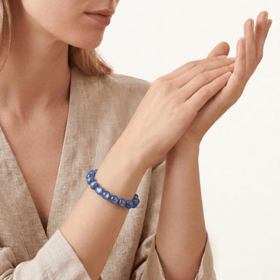 The Kyanite Strand — Directional Alignment, bracelet on wrist, lifestyle model photo BE.