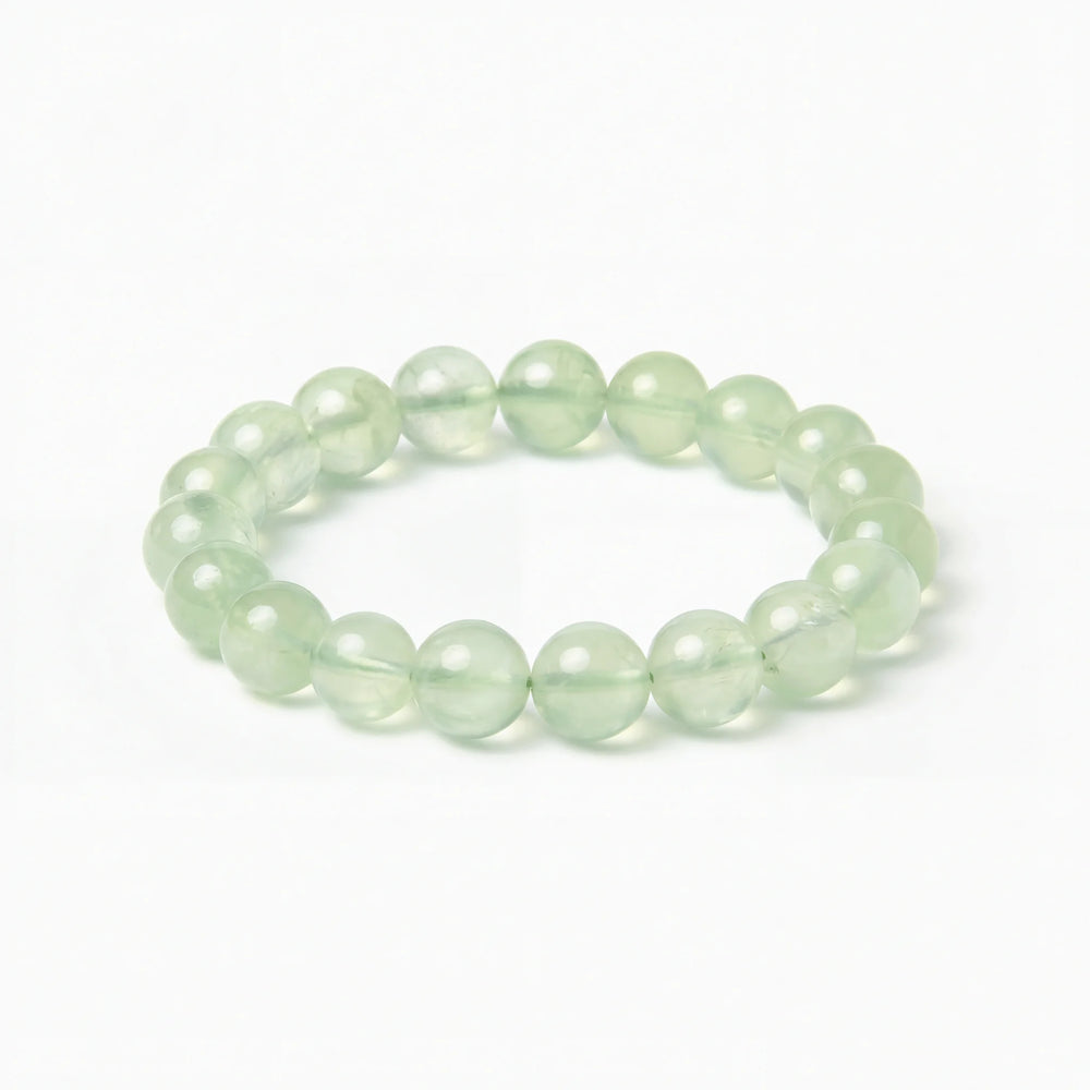 The Prehnite Strand — Luminous Matrix, bracelet on white background BE.