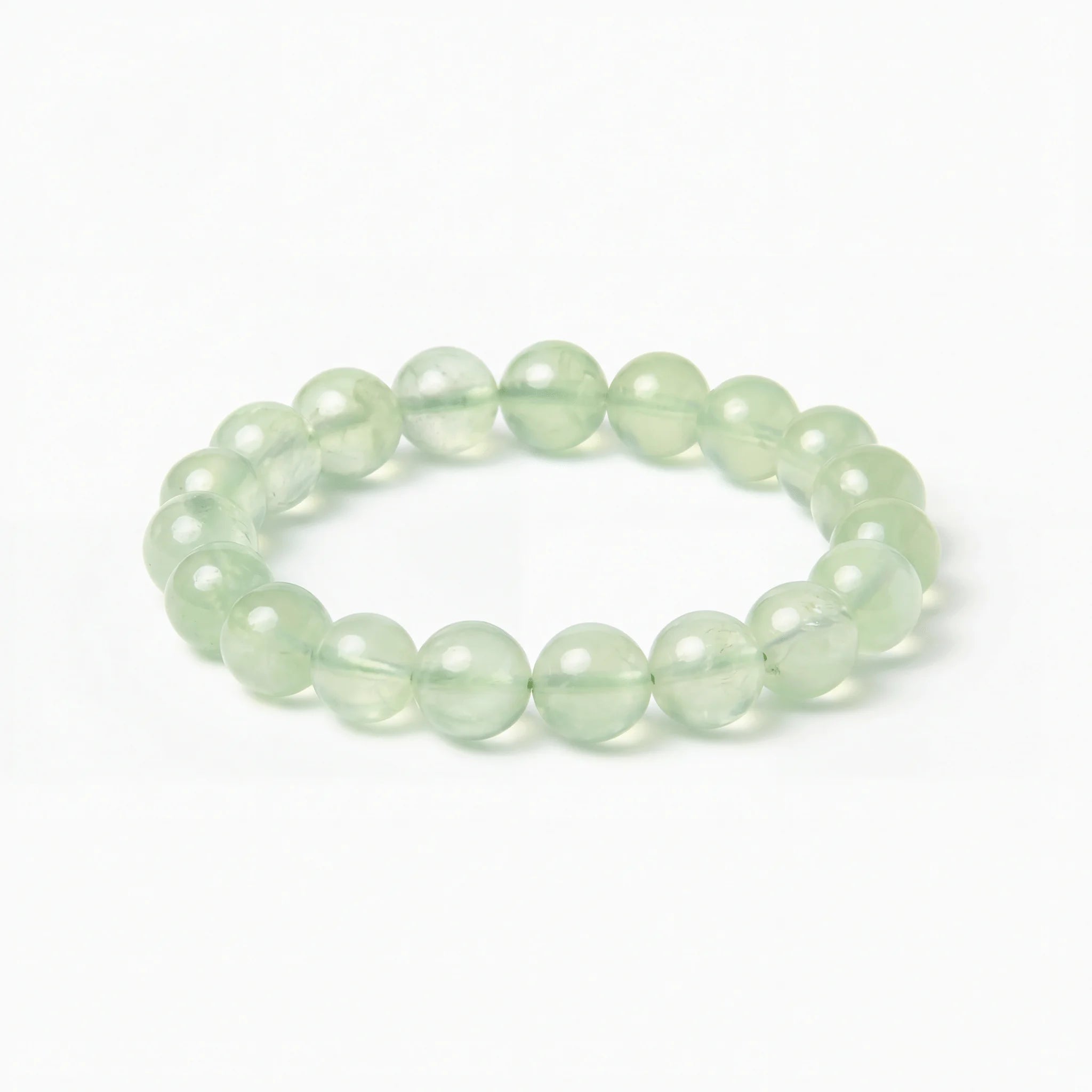 The Prehnite Strand — Luminous Matrix, bracelet on white background BE.