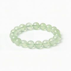 The Prehnite Strand — Luminous Matrix, bracelet on white background BE.