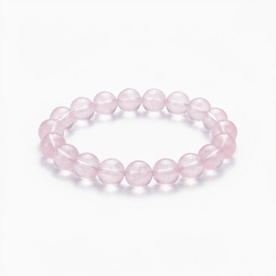 The Rose Quartz Strand — Serene Luminescence, bracelet on white background BE.