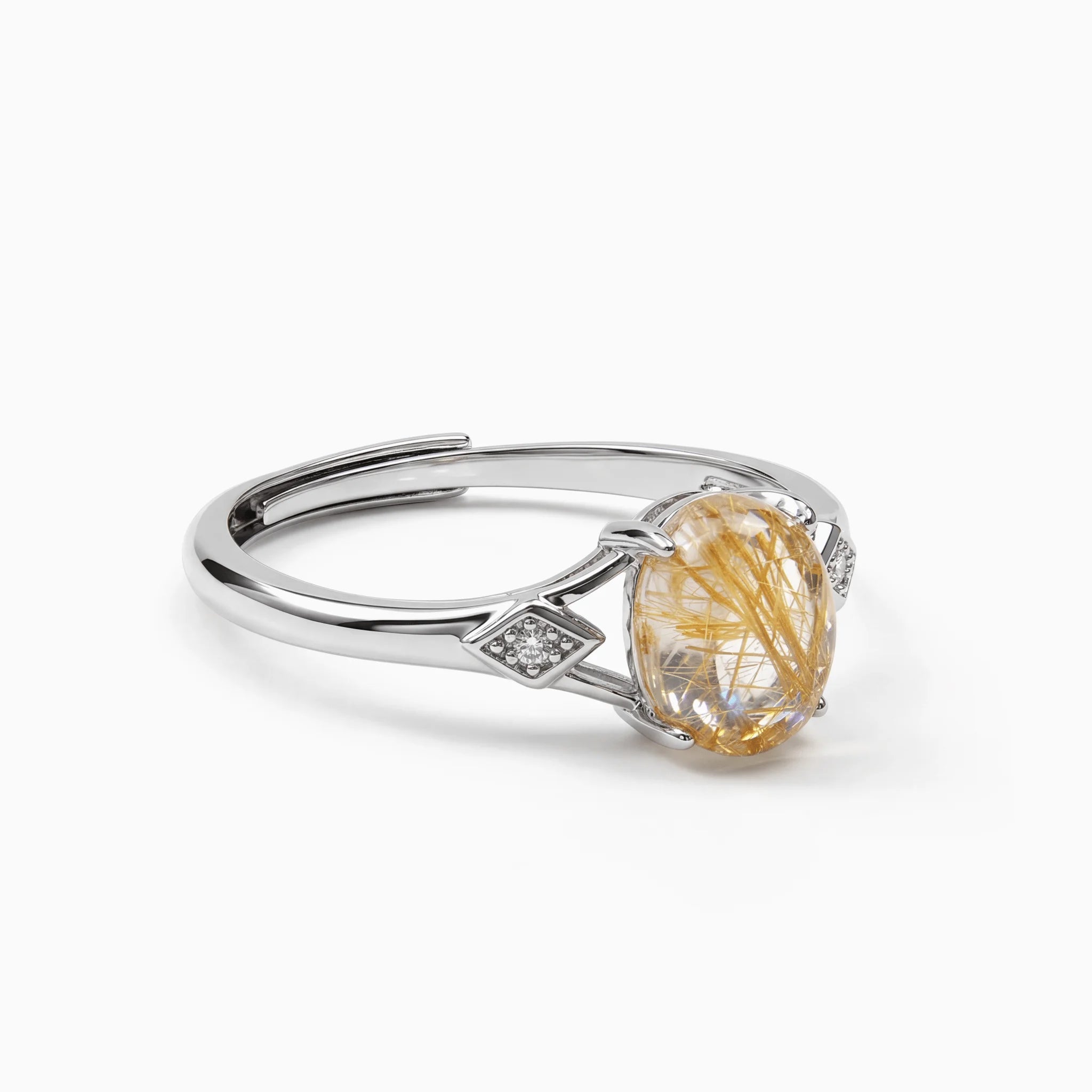 The Rutilated Quartz Integration, ring on white background BE.