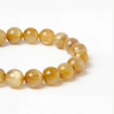 The Rutilated Quartz Strand — Golden Array, bracelet detail view BE.