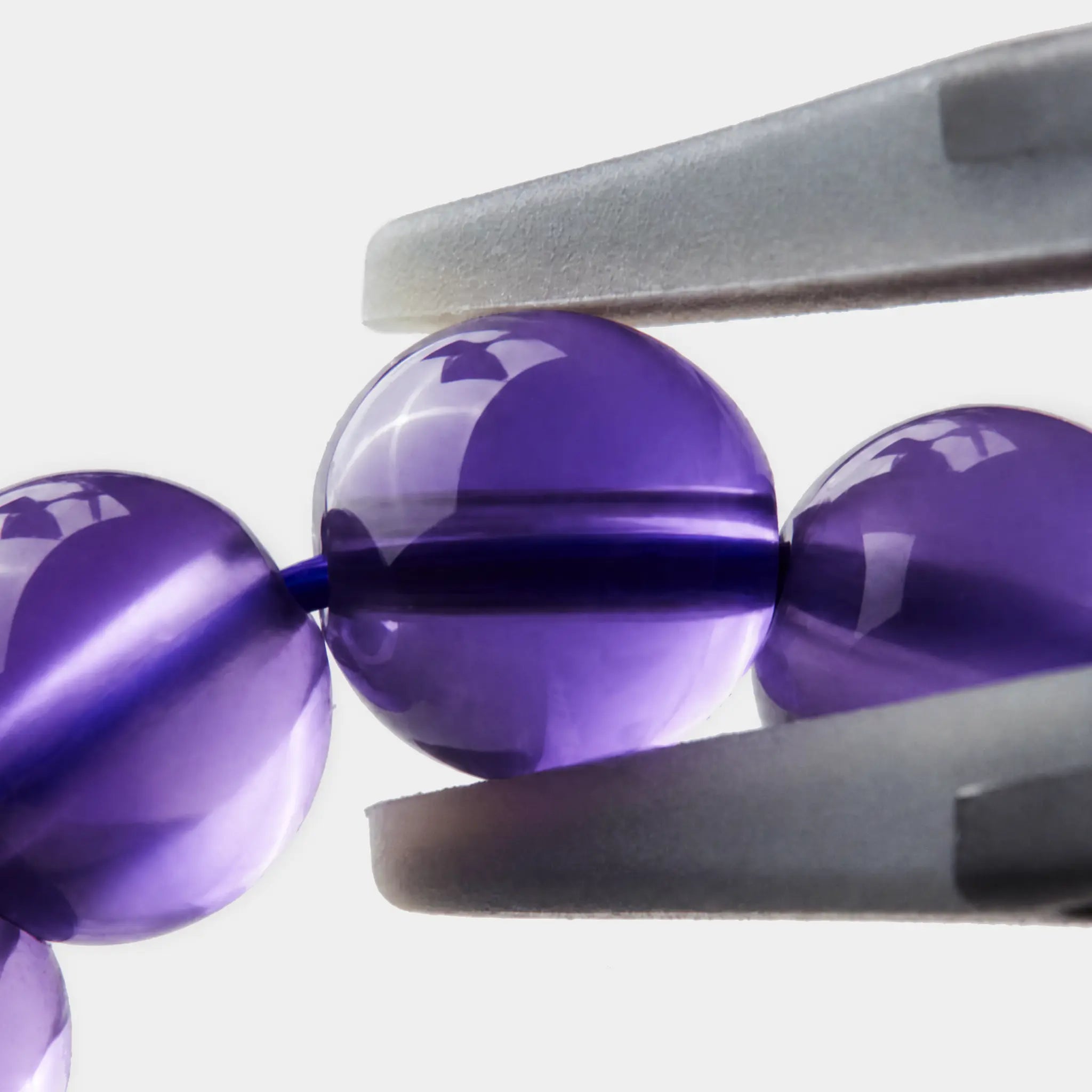 The 6mm Bolivian Amethyst Strand Bracelet — Bolivian Depth, supplemental detail image 1.