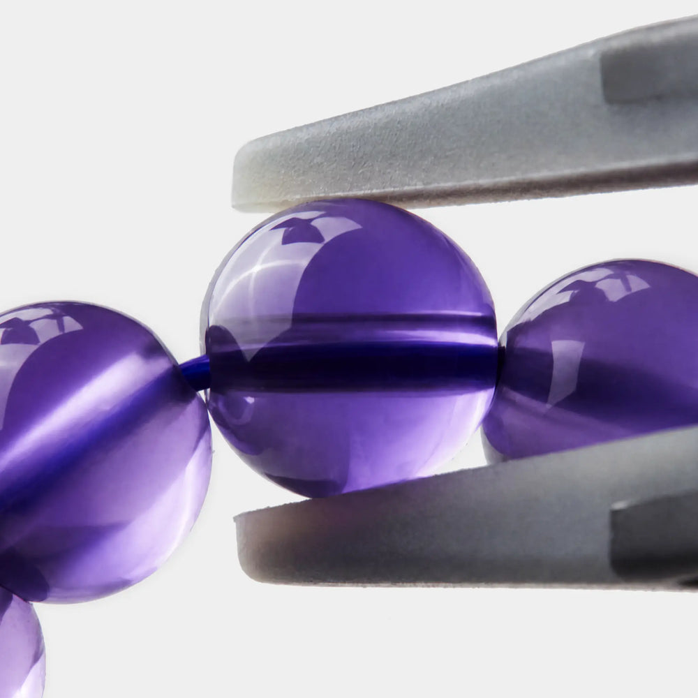 The 6mm Bolivian Amethyst Strand Bracelet — Bolivian Depth, PDP close-up detail image 2.