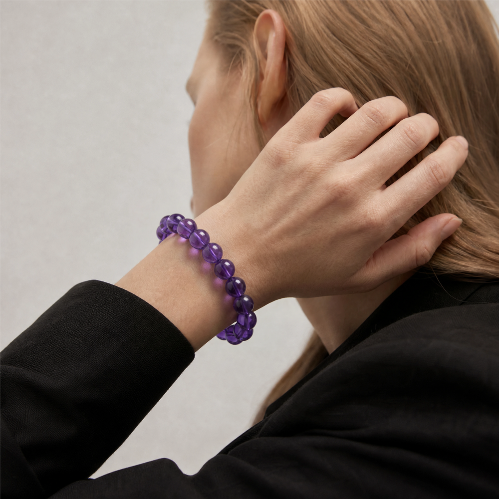 The Bolivian Amethyst Strand Bracelet - Bolivian Depth worn at the wrist, BE.