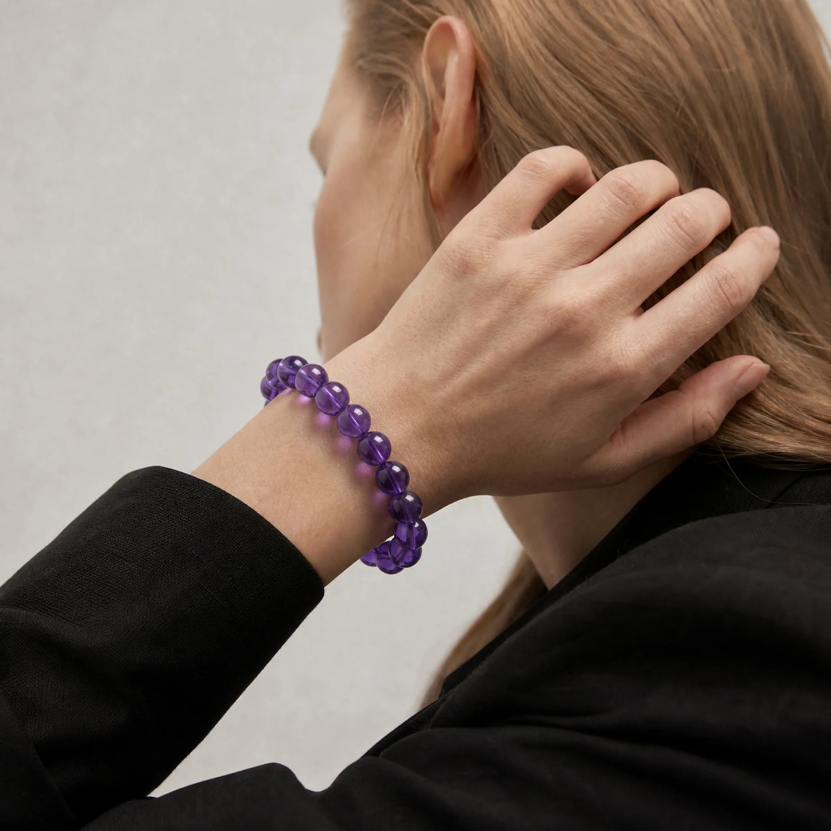 The Bolivian Amethyst Strand Bracelet - Bolivian Depth worn at the wrist, BE.
