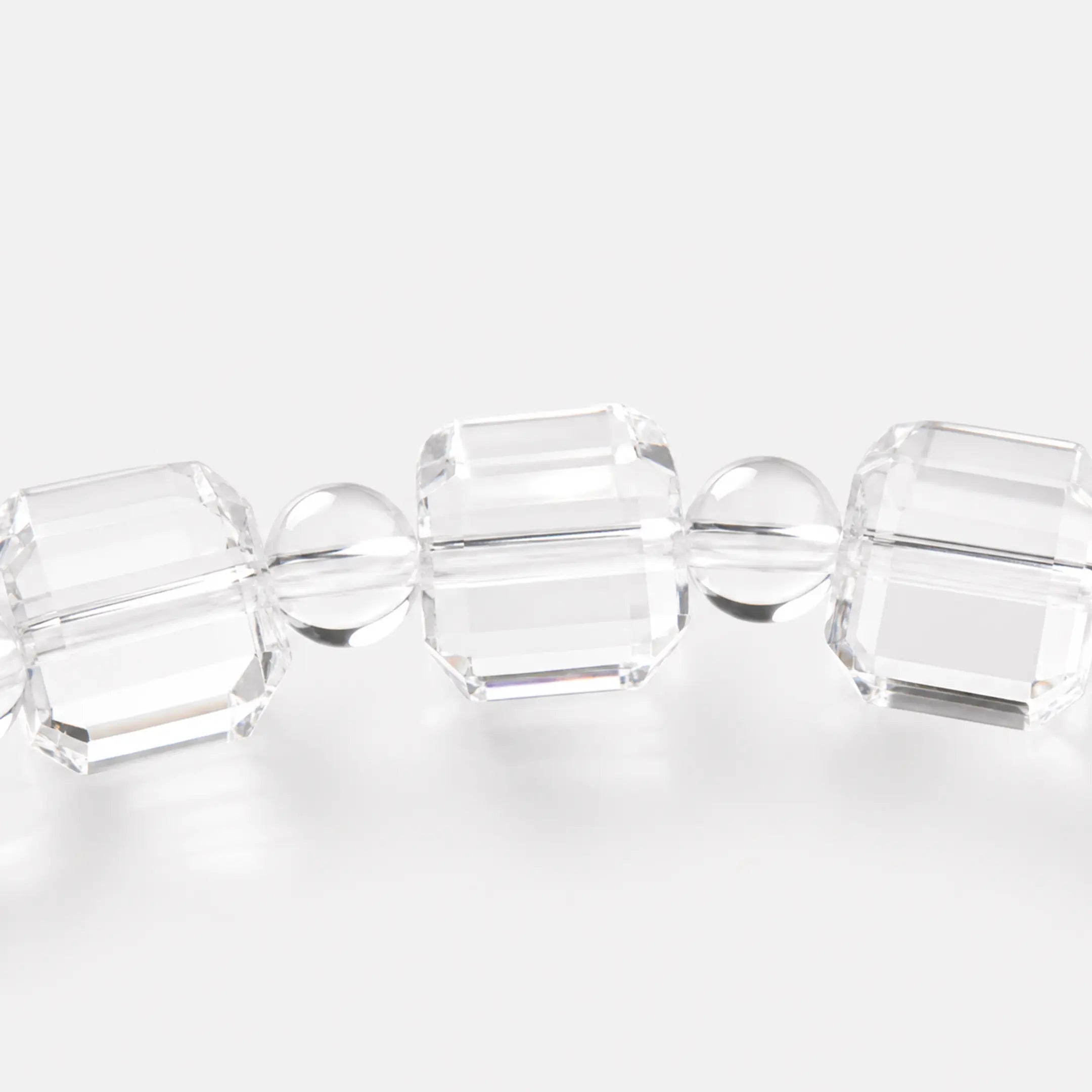 Clear Quartz Bracelet close-up — faceted clear quartz cube geometry, BE.