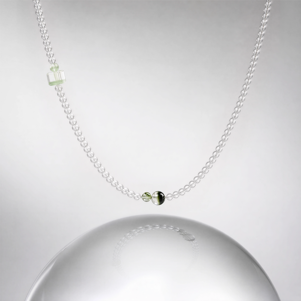 The Emerald Phantom Bracelet - Tri-Wire Architecture detail with clear quartz and green phantom accents, BE.