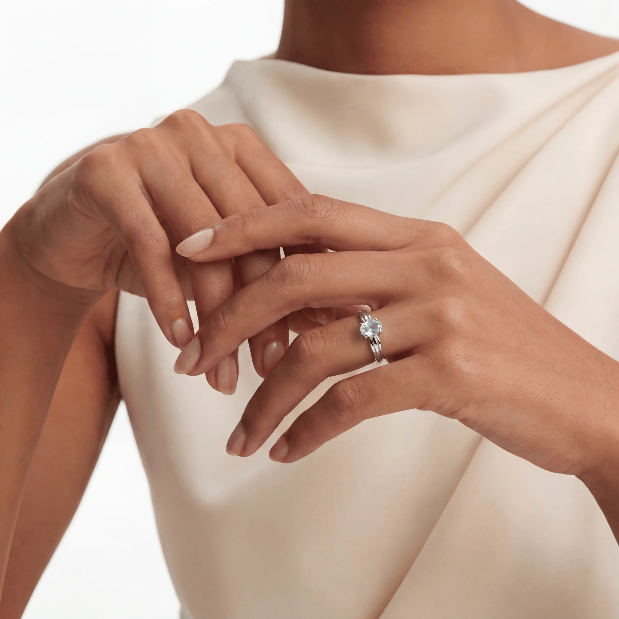 The Topaz Structure, ring worn on finger, lifestyle model photo BE.